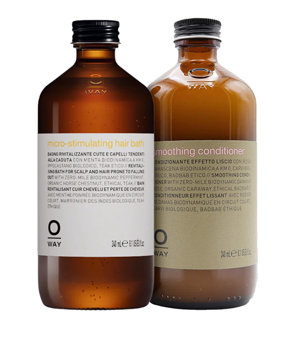 Oway bottle of shampoo and conditioner