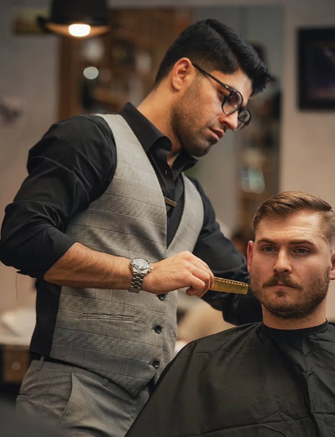 Ahmad barbering client