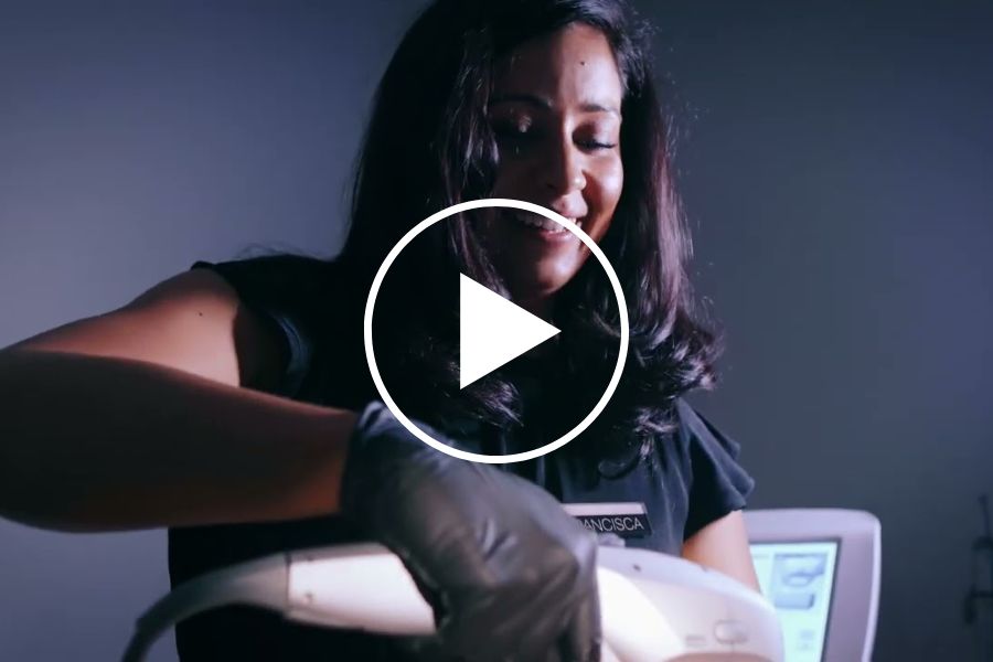 Francesca face of Man therapist performing skin treatment