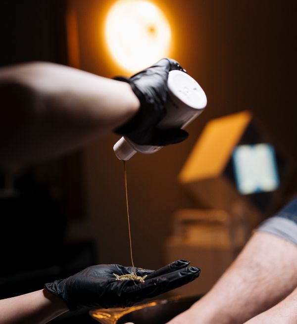 Applying oil during a grooming session