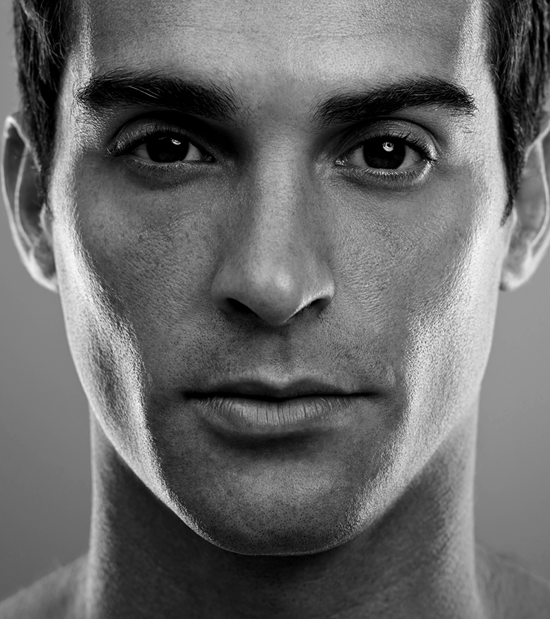 Close-up of a man's neck.